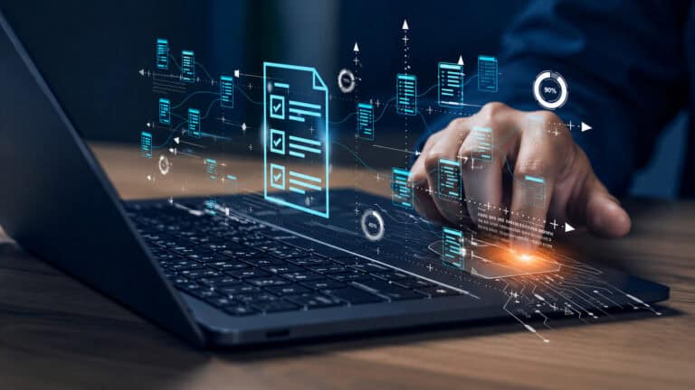 Digital workflow and data integration dashboard displayed on a laptop during business process management.