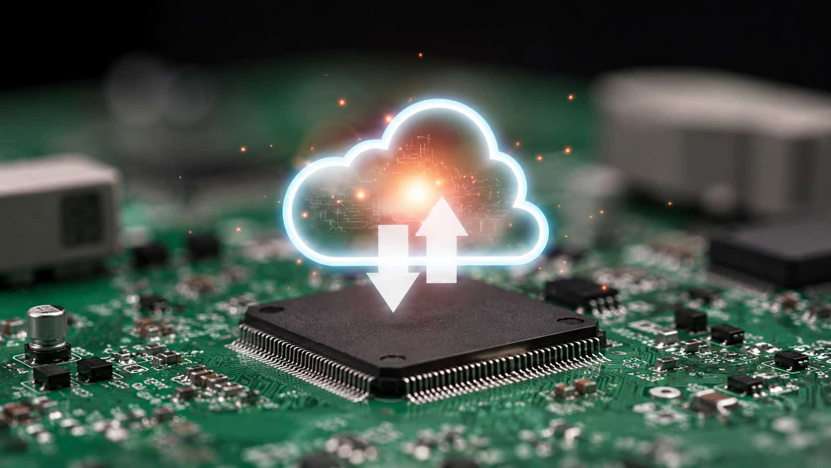 Cloud computing concept visualized above an industrial processor on a printed circuit board for edge-to-cloud data connectivity.